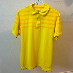 Men’s Under Armour golf polo, size medium.